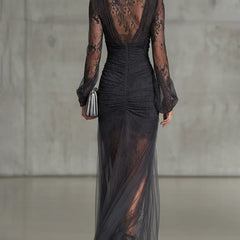 Quintina | Long black dress with deep V-neck and dramatic slit