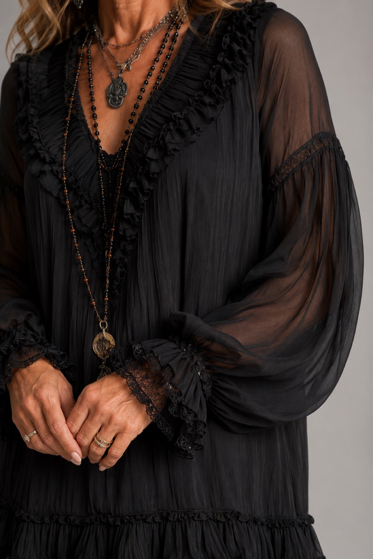Sheer sleeves that cover — beautifully